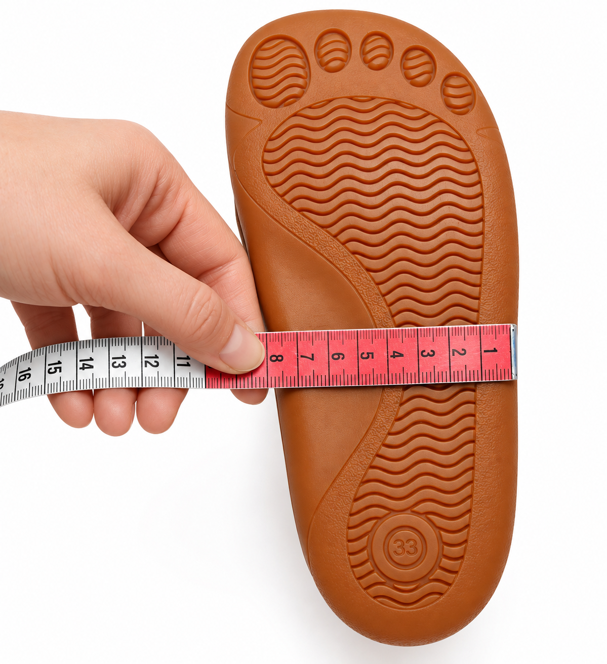 Measure across the middle of the outer sole