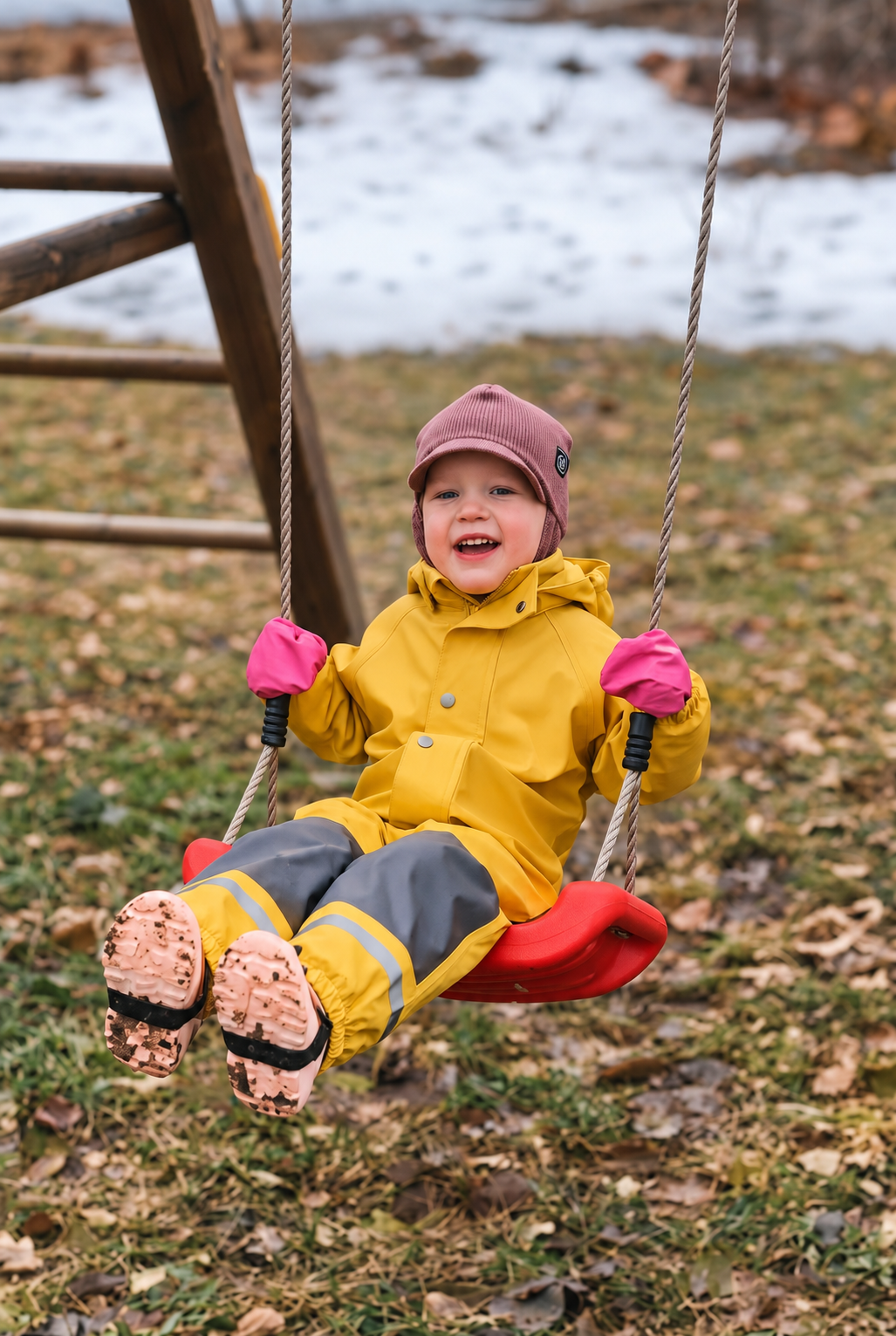 Child wearing BootHug straps outdoors